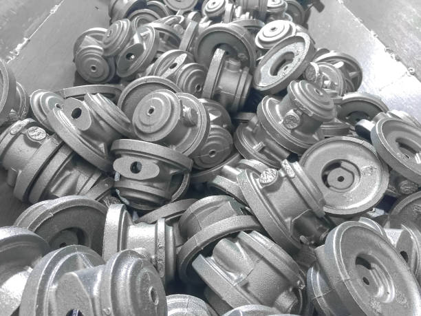 Heap of casting automotive parts cleaning in factory